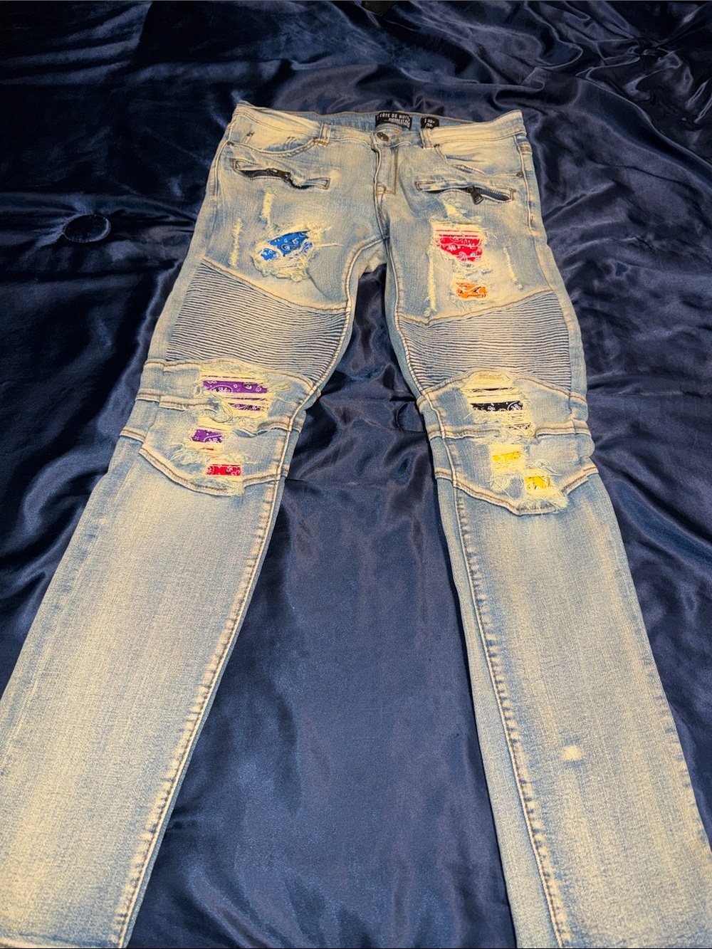 Men's Light Wash Skinny Jeans with Multicolor Patch Details